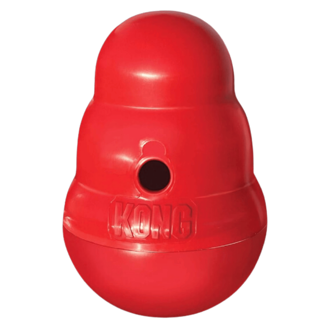 Red KONG toy with a hole in the middle, designed for dogs to play with and dispense treats.